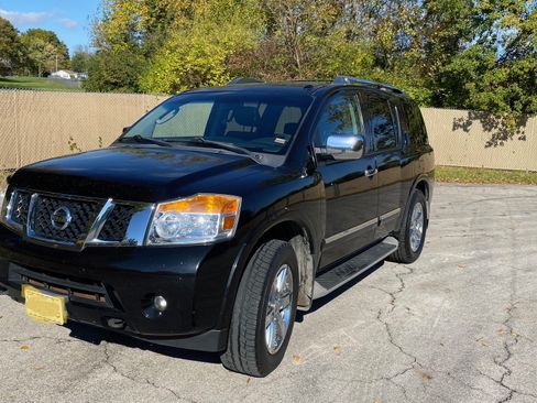 Used 2011 Nissan Armada Platinum w/ 2nd Row Captain Seat Pkg image 2