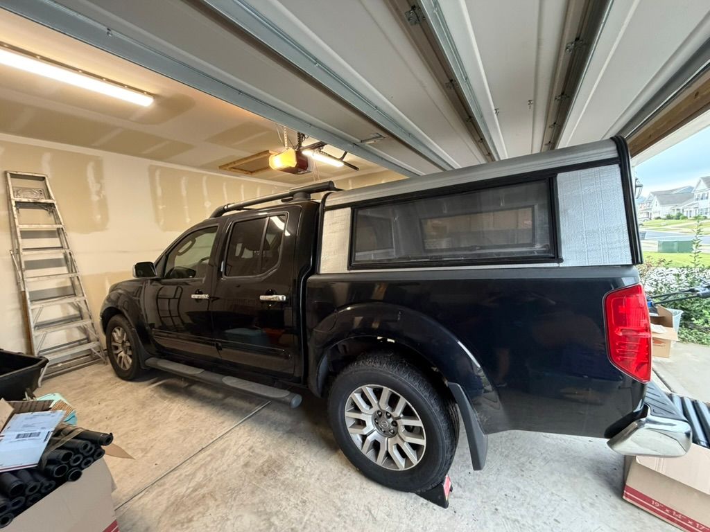 Used 2010 Nissan Frontier LE w/ LE Value Truck Pkg AWD/4WD image 1