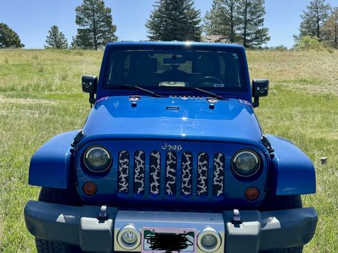 Used 2009 Jeep Wrangler Unlimited Sahara w/ Trailer Tow Group AWD/4WD image 1