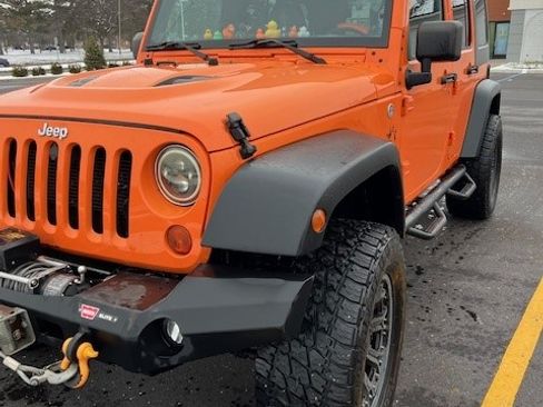 Used 2013 Jeep Wrangler Unlimited Sport AWD/4WD image 1
